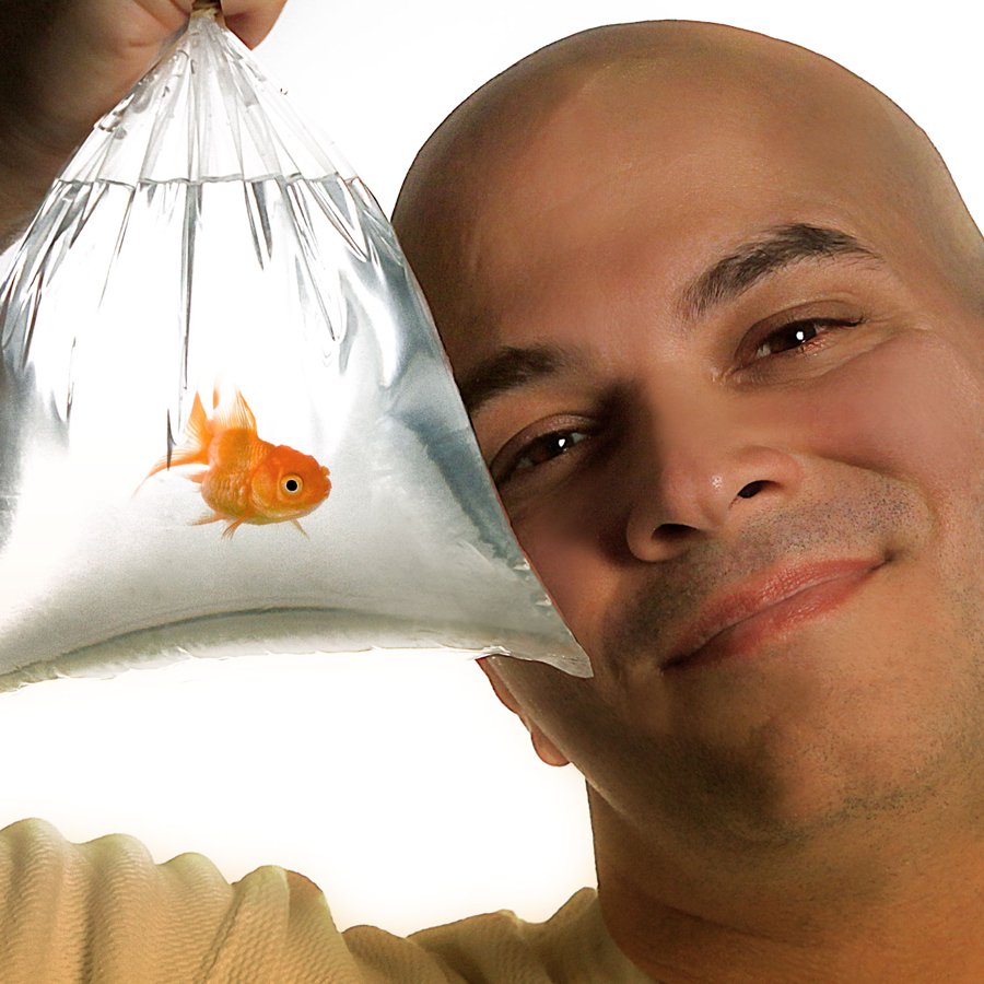 Marc Mauro holding a goldfish in a bag